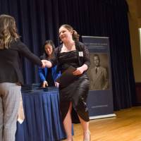 Emily shaking hands with Emma